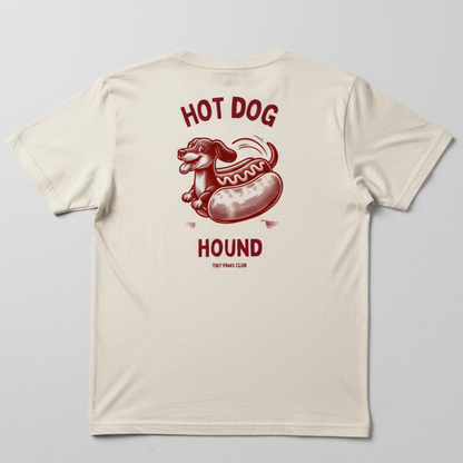 Beige t-shirt with a red hot dog graphic and text on a gray background